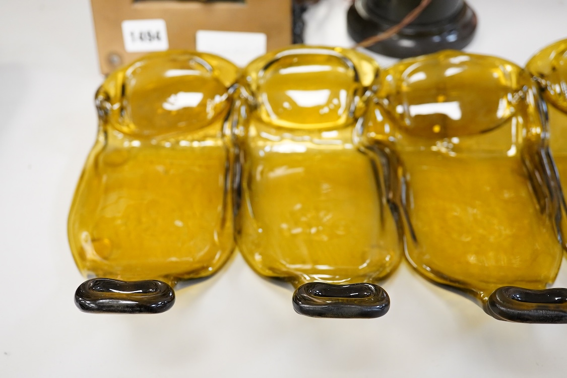 A Mary Canny five sectioned art glass ‘Amber bottle tray, 48cm wide x 24cm deep